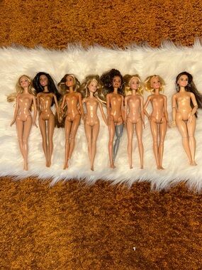Lot of 8 Fashion Dolls - Mixed Skin Tones